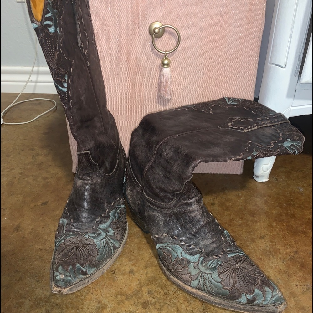 Brown leather cowboy boots